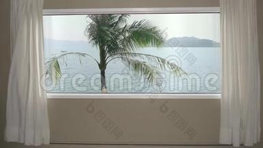 从房间的窗户观看酒店棕榈树的背景蓝色海水和山丘。 背景板，色度键视频